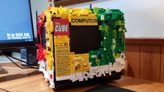 Custom Lego gaming PC with 'The Cube' badge on left hand corner and system spec list on bottom
