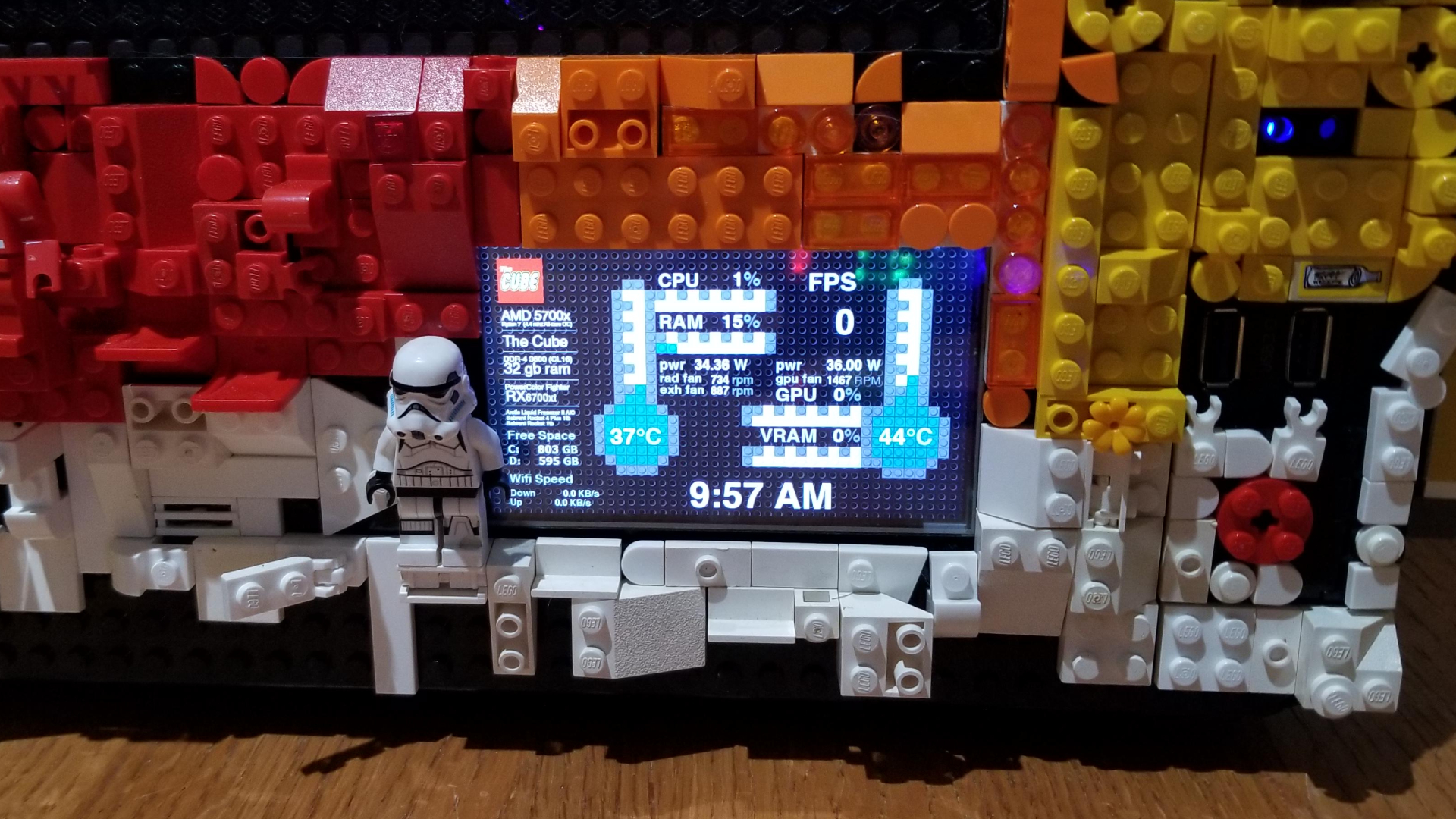 Custom Lego gaming PC with stromtrooper mini figure on left and performance display in centre