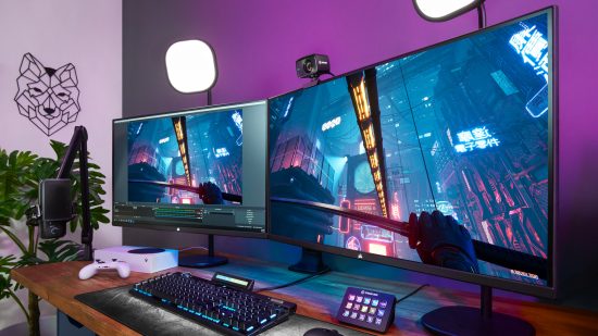 The new Corsair Xeneon gaming monitor sits atop a gaming desk, surrounded by Corsair and Elgato peripherals