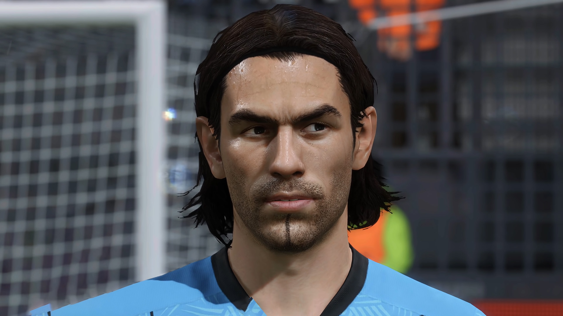 FIFA 23 icons: Robert Pires staring at a football player in the distance