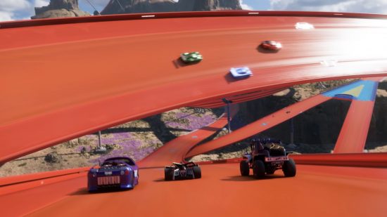 Forza Horizon 5 Hot Wheels DLC map: Cars speed along overlapping orange tracks high above the ground