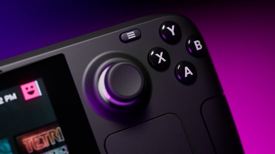 A close up of a Steam Deck, focussing on its right side face buttons and thumbstick