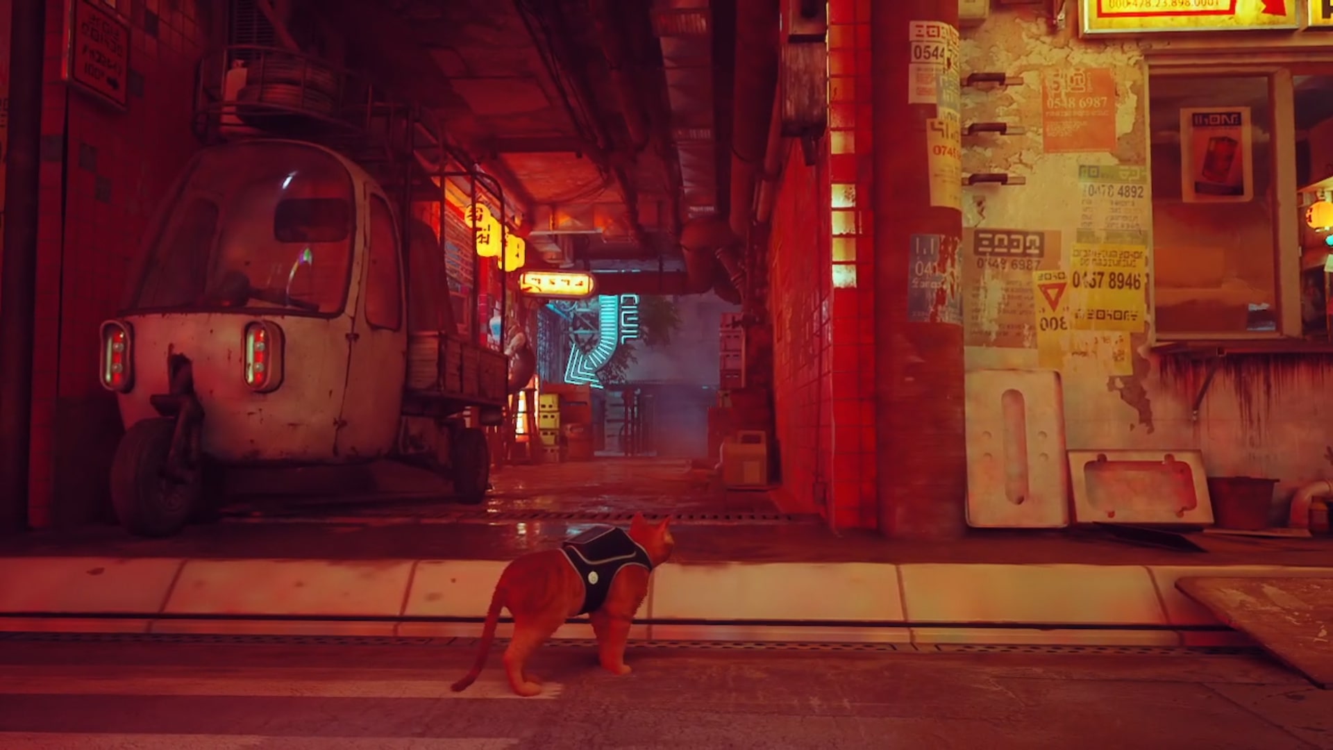 Stray memories guide: The orange tabby standing at the mouth of the alleyway between a compact delivery vehicle and the barbershop. At the end of the alleyway, a floating neon arrow can be seen pointing to the left