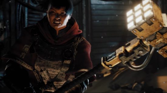 Warhammer 40K Darktide delayed: A female zealot hefts a powerful thunder hammer
