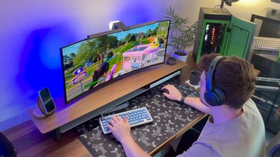 Xbox fridge gaming PC setup with creator using rig at desk playing Fortnite