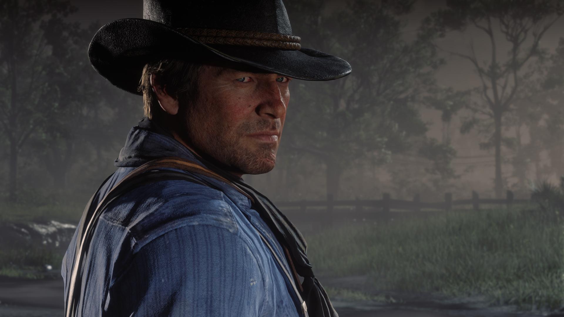 Red Dead Redemption 2 adalah game sejarah yang lebih baik daripada Assassin's Creed.  Seorang koboi berdiri di hutan yang gelap, dengan tatapan merenung 