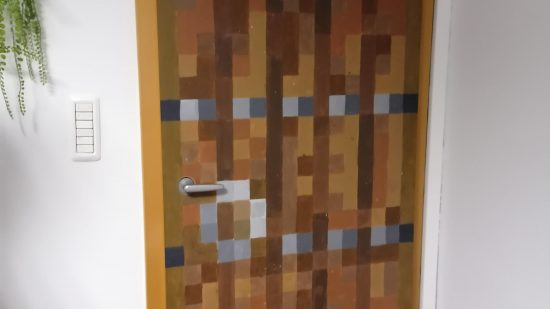 This image shows a Minecraft door in real life. 