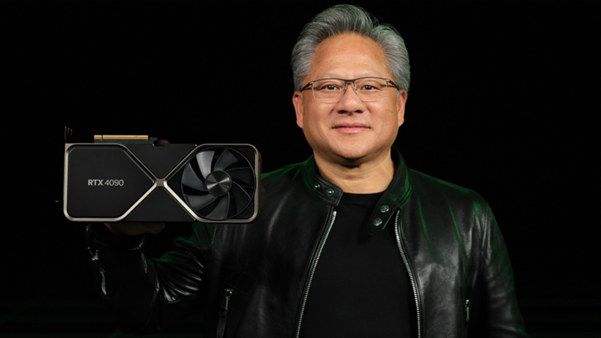 Nvidia CEO Jensen Huang holding an RTX 4090 Founders Edition