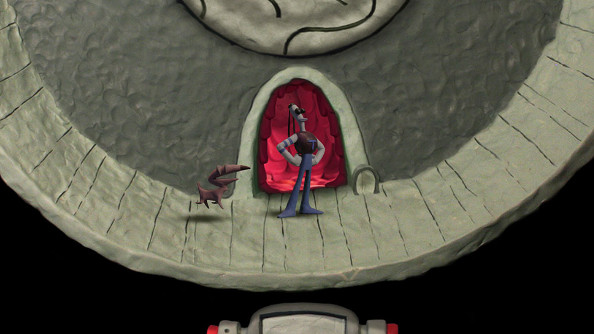 A proud puppet stands at the exit to a tunnel