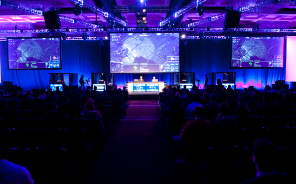 The main stage at IPL 5, viewed from the back of the room down the center aisle.