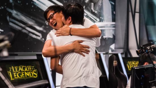 A pair of League of Legends pros celebrate their qualifying for 2014 Worlds.